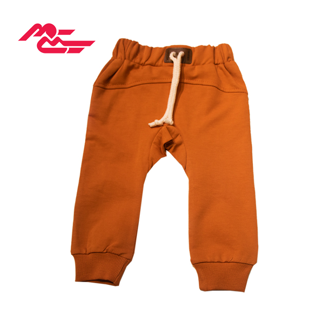 ست بلوز و شلوار پارچه ای پسرانه طرح خرس نارنجی